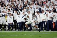Ji'Ayir Brown #16 of the Penn State Nittany Lions runs with the ball after an interception against the Utah Utes